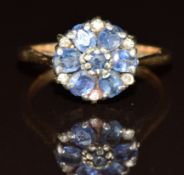 A 9ct gold ring set with sapphires and diamonds in a cluster, 3.6g, size P