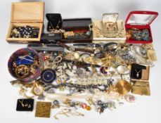 A collection of costume jewellery including Trifari necklace, Sarah Coventry brooch, compacts,