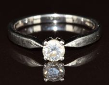A platinum ring set with a round cut diamond of approximately 0.3ct, with certificate, 3.7g, size L