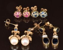 Four pairs of 9ct gold earrings comprising one pair set with a cluster of rubies, one a cluster of