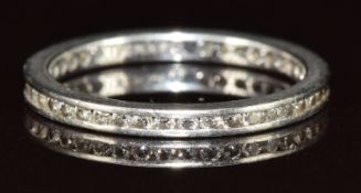 Theo Fennell platinum eternity ring set with round cut diamonds, the total weight approximately 0.