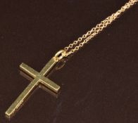 An 18ct gold cross pendant (2.6g, 3cm) on 9ct gold chain (0.8g, 41cm)