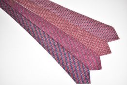 Four Hermès silk ties, all with horse related decoration