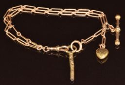 A 15ct gold bracelet made from an old fob chain with watch key, heart charm and T-bar, 11.2g, 18.