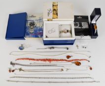 A collection of jewellery including suite of pressed amber and silver, bangle, coral necklace,