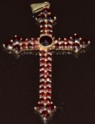 A silver pendant set with Bohemian cut garnets marked 900, in J W Long & Co Cardiff box, 4.8g, 5.