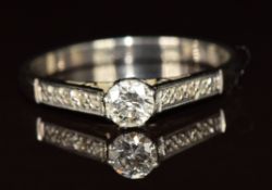 An 18ct white gold ring set with a diamond of approximately 0.3ct in a platinum setting, 2.5g,