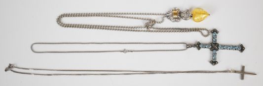 A silver necklace with 18k gold decoration and a glass heart pendant, originally bought from Jenny