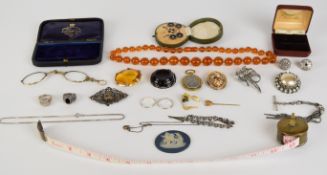 A collection of jewellery including silver studs, lorgnettes, three silver rings, Wedgwood plaque,