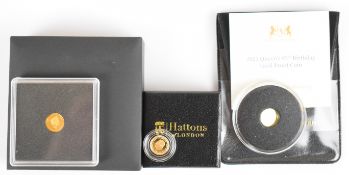 Three miniature gold coins comprising 2024 Charles III Tristan Da Cunha 1/8 gold sovereign, 2021