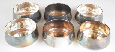 Set of six likely Middle or far Eastern silver bowls with hammered decoration, marked to bases 100%,
