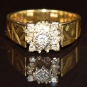 An 18ct gold ring set with diamonds, 5.3g, size K