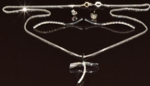 An 18ct white gold stylised cross pendant set with diamonds (3.5cm) on 18ct white gold chain (