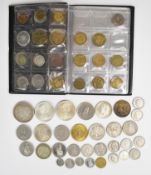 Small collection of world silver and base metal coins, some in a pocket album, including a 1939