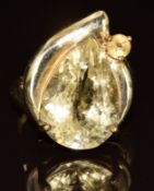 A 9k gold ring set with pear and round cut topaz, 7.5g, size N