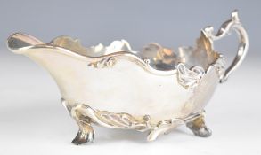 A S Bonebakker & Son Amsterdam Dutch silver sauce boat with scrolling and foliate edge and feet,