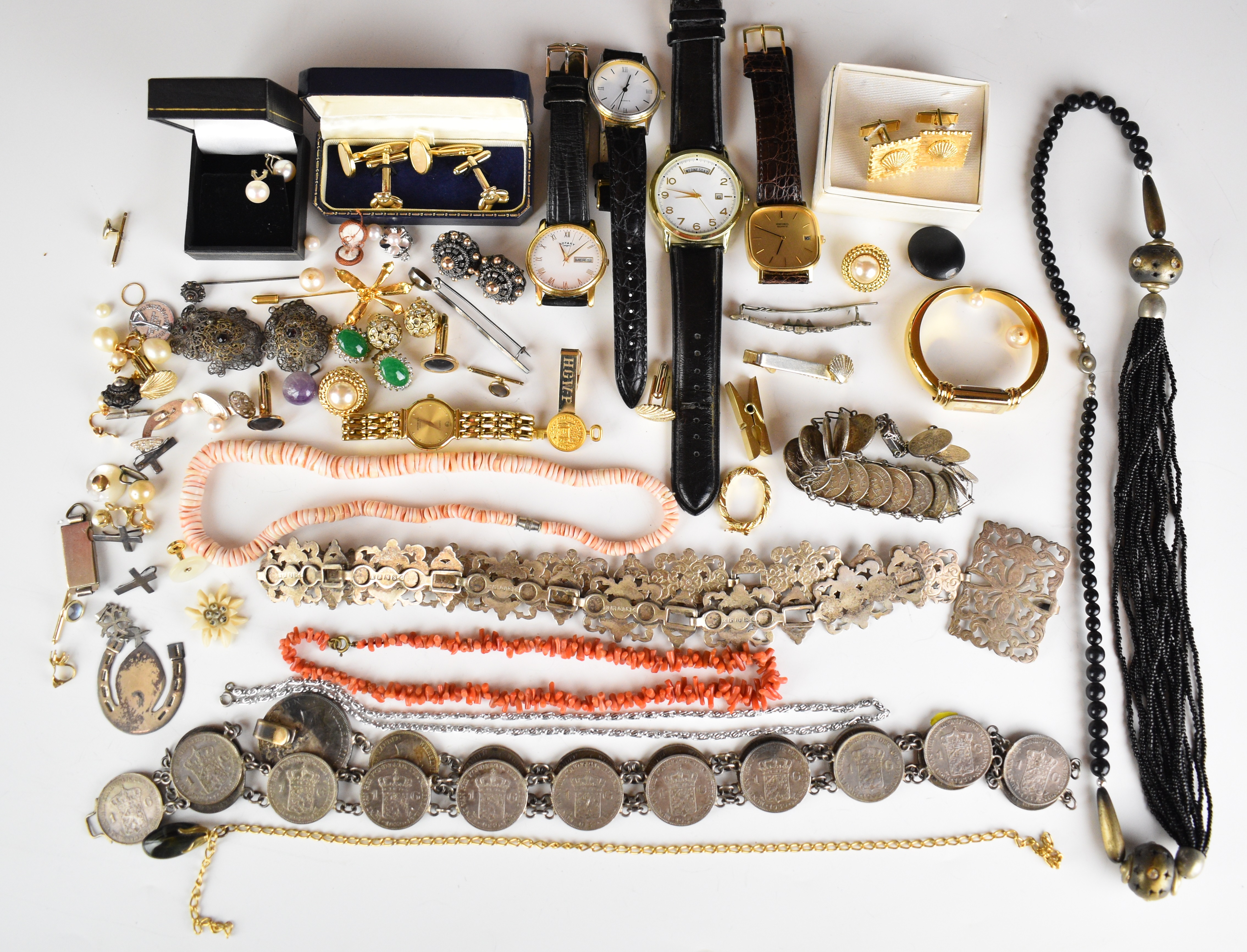 A collection of jewellery and watches including Raymond Weil watch, coral necklace, silver