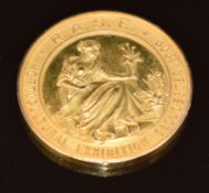 A 9ct gold horticultural medallion embossed with a lady and flowers and 'Horticultural Exhibition