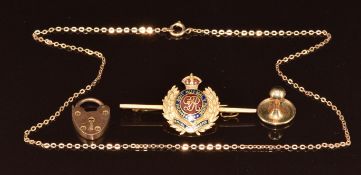 A 9ct gold Royal Engineers brooch, 9ct gold stud, 9ct gold heart padlock clasp, and a 9ct gold