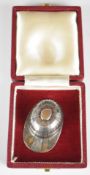 George V novelty Britannia standard hallmarked silver caddy spoon formed as a jockey's cap, London
