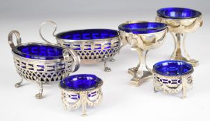 Three pairs of Dutch silver salts with blue glass liners, length of longest 14.5cm, weight without