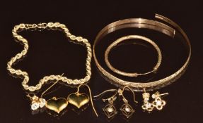 Four pairs of 9ct gold earrings, 9ct gold bangle and 9ct gold rope twist bracelet, 10.2g