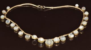A silver gilt necklace set with twenty one moonstone cabochons, 21g, 40cm