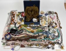 A collection of jewellery including turquoise necklace, lapis lazuli bracelet, amethyst pendants,