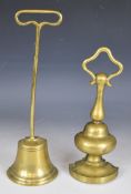 Two 19thC brass door porters / stops, one likely Georgian, the other with impressed cast iron inset,