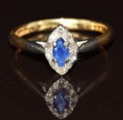 A 14ct gold ring set with a marquise cut sapphire surrounded by diamonds in a platinum setting, 2.