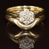 A 9ct gold ring set with diamonds in a cluster and a fitted 9ct gold wedding band / ring, 2.9g, size