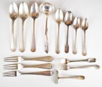Mainly Dutch silver cutlery comprising four various forks, sauce ladle, matching spoon and fork,