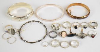 Sixteen silver rings including cameo, marcasite, mother of pearl, garnet, pearl, agate, etc and four