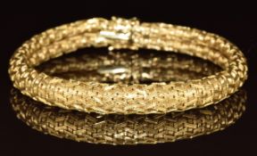 A yellow metal mesh bracelet, tests as 18k, 37.7g, 19cm