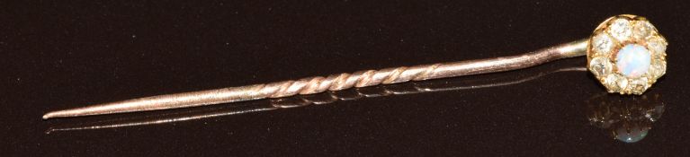 Gold stick pin set with an opal and diamonds, in Newport box