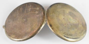 Indian silver compact engraved with a map of India set with rubies, the reverse depicting a man