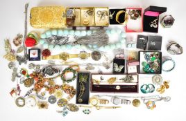 A collection of jewellery including watches, vintage brooches, earrings, two Jewelcraft brooches,