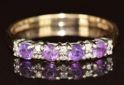 A 9ct gold ring set with diamonds and amethysts, 2.1g, size O