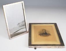 Two hallmarked silver photograph frames, the larger to suit 8 x 6 inch photo, Birmingham 1903, maker