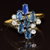 A 9ct gold ring set with marquise cut sapphires and diamonds, 3.7g, size U