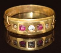 An 18ct gold ring set with rubies and diamonds, Birmingham 1886, 3.3g, size O