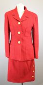 Chanel Boutique vintage ladies skirt suit in cherry red with gold coloured buttons of basket weave