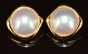A pair of 18k gold earrings set with Mabe pearls measuring approximately 12.8mm, 6.5g