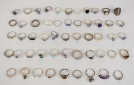 Fifty three silver rings including tanzanite, pearl, amethyst, etc