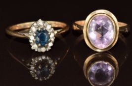 Two 9ct gold rings, one set with an oval cut amethyst the other a sapphire surrounded by diamonds,
