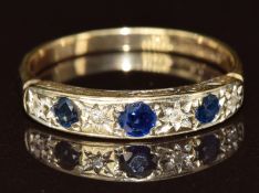 A 9ct gold ring set with sapphires and diamonds, 1.7g, size L