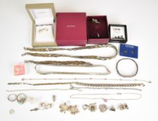 A collection of jewellery including filigree earrings, silver including two bracelets, three charms,