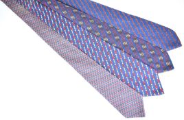 Four Hermès silk ties, all with buckle or nautical decoration
