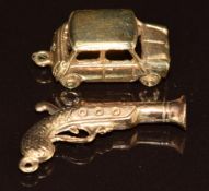Two 9ct gold charms / pendants, one in the form of a Mini Cooper and the other a blunderbuss gun 4.