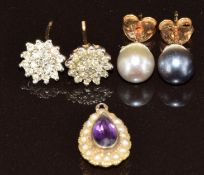Two pairs of 9ct gold earrings, one pair diamonds and one pearls and an Edwardian charm set with